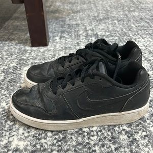 Boys black Nike shoes